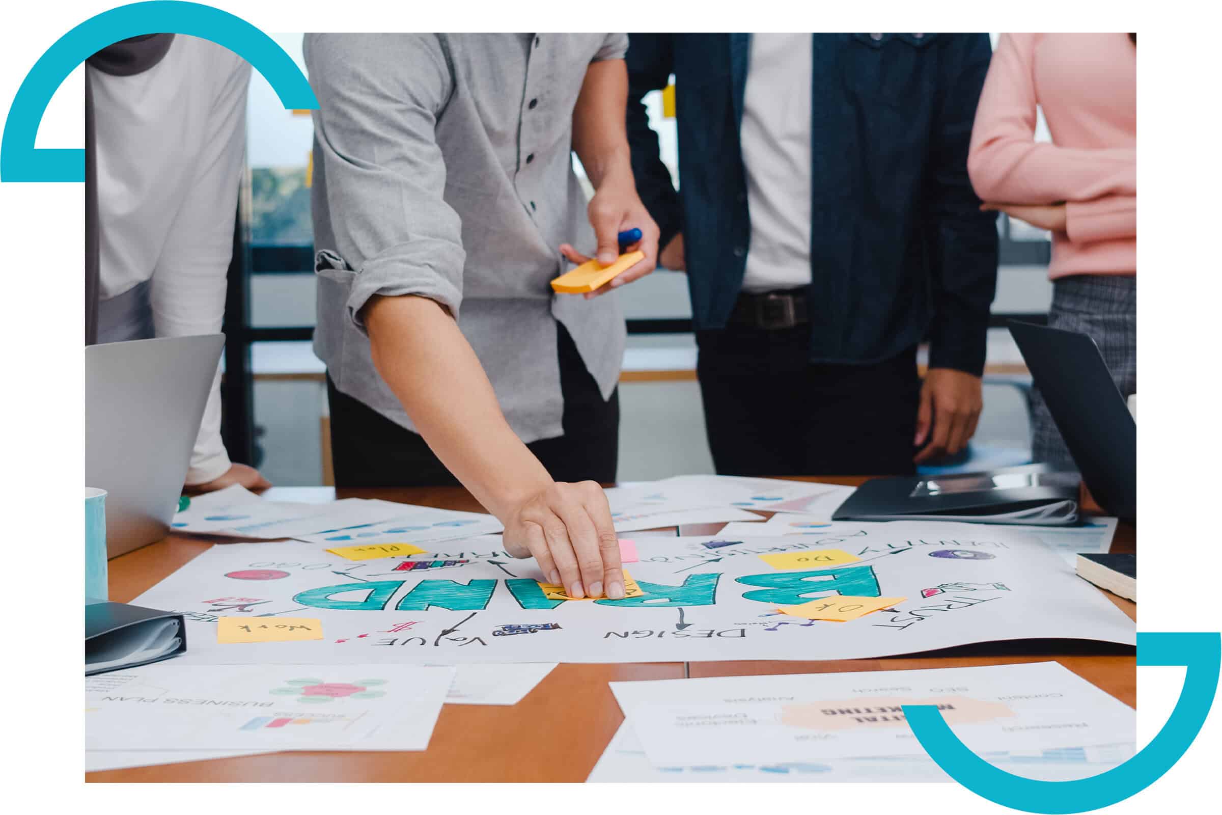 Team working on brand strategy and positioning in a modern workspace